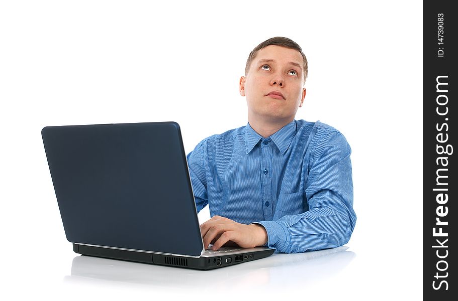 Young man working on his laptop computer