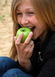 Woman Bite Off Green Apple Royalty Free Stock Photography Woman Bite Off Green Apple Royalty Free Stock Photography