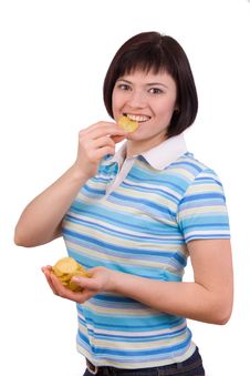 Young Woman Eating Potato Chips. Stock Photos Young Woman Eating Potato Chips. Stock Photos