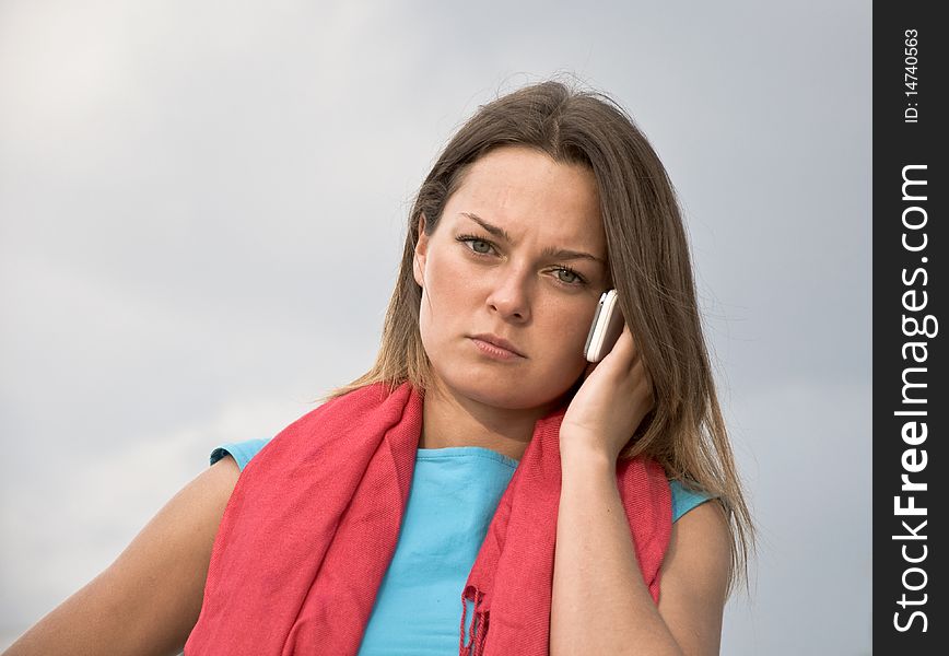 Young business woman in a red scarf