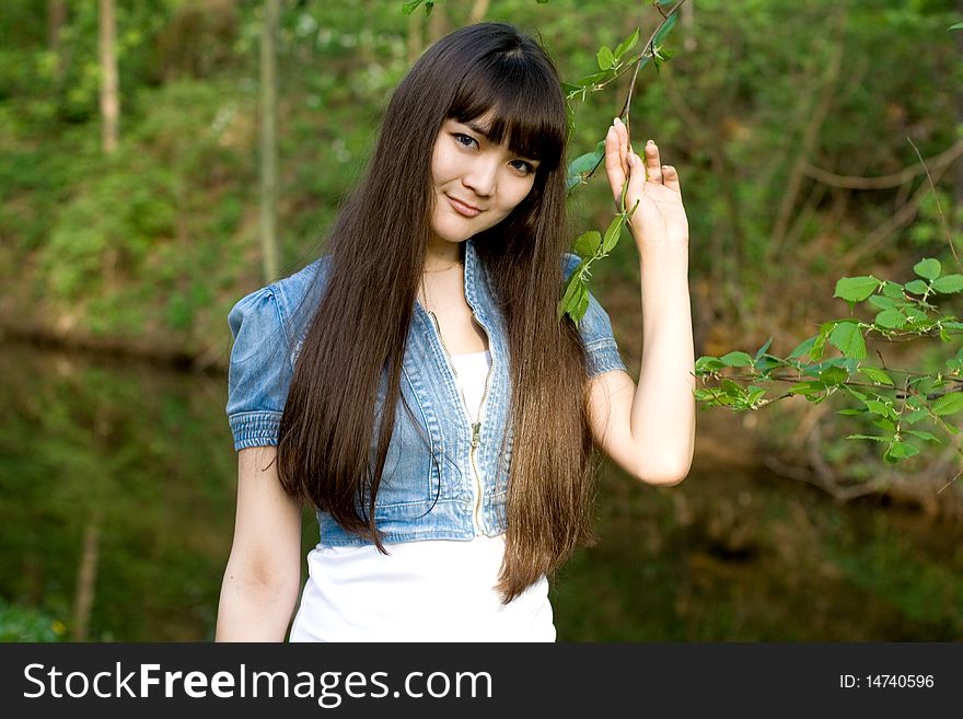 Girl walking in summer park. Girl walking in summer park