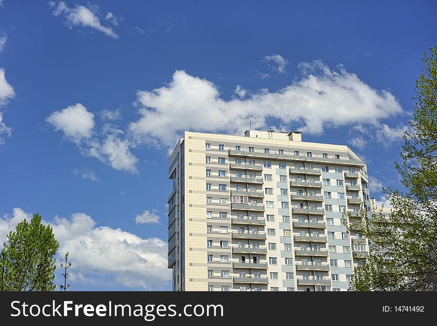 Building with trees and sky on background