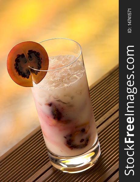 Smoothie with black berries and crushed ice