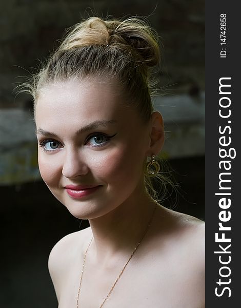 Portrait of beautiful white woman in ruins