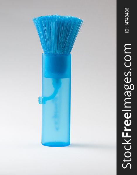Retractable cleaning brush for electronics.