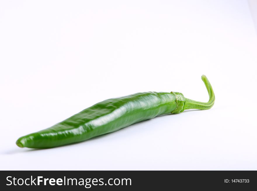 Green pepper isolated on a white background.