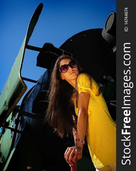 Beautiful Girl With Train On Background.