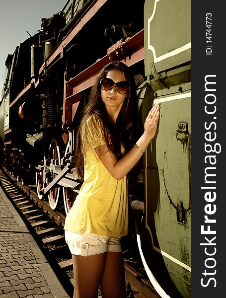 Lady In Glasses Next To Old Train.