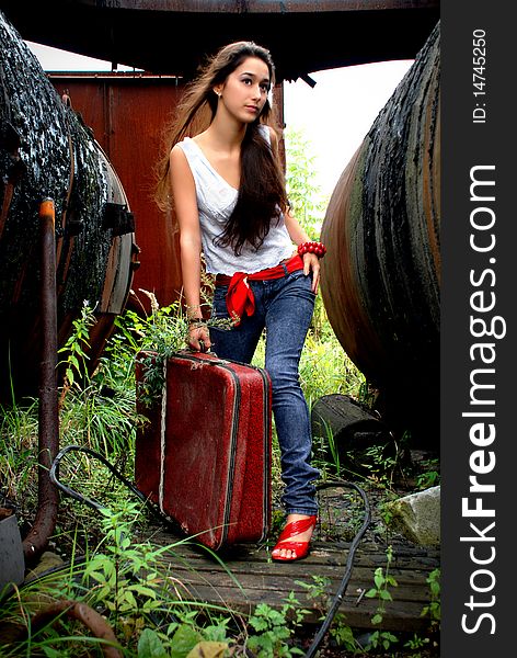 Stylish Image Of Girl With Red Suitcase.