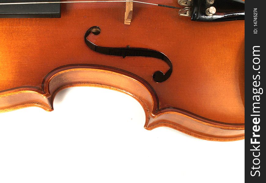 Violin detail with f-hole as center of focus