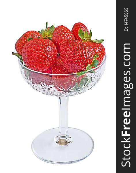Strawberry on a plate on a white background. Strawberry on a plate on a white background