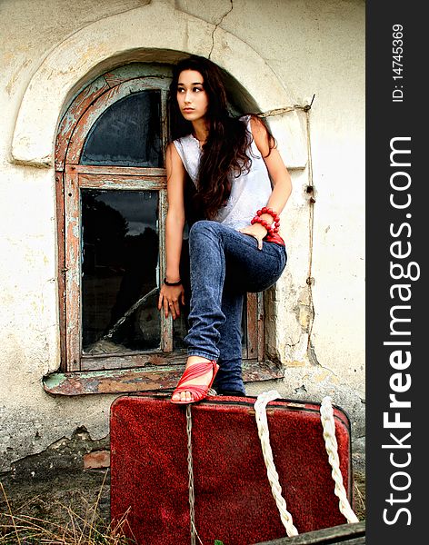 Charming Model With Red Suitcase.