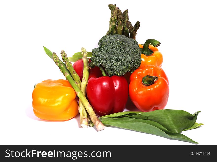 Heap of fresh ripe vegetables isolated at white background