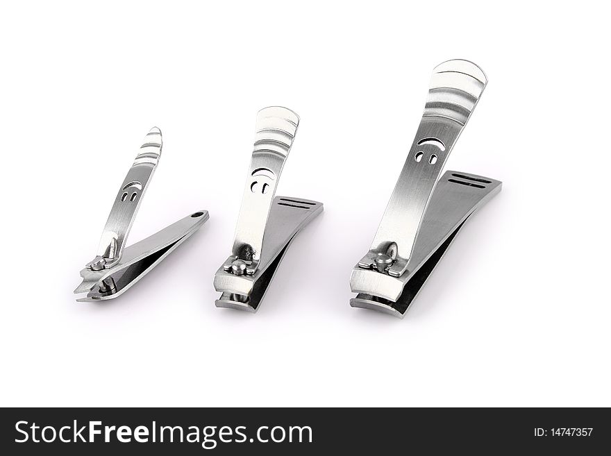 Nail clipper and Scissors Isolated On White with Clipping Path Due to technical reasons, clipping path is available only for the extra large size of this file.