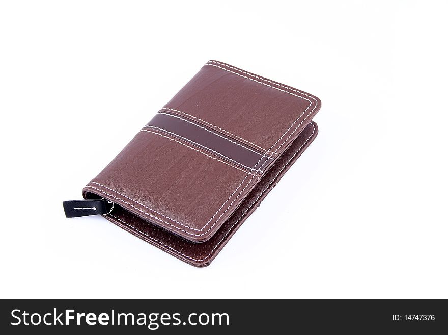 Lage isolated brown leather wallet on a white background