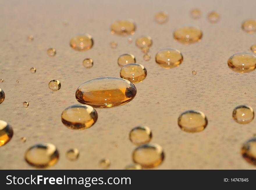 Background of water drops on gold foil paper. Background of water drops on gold foil paper