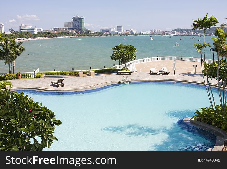 Swimming pool on a sunny day.Pattaya city in Thailand . Swimming pool on a sunny day.Pattaya city in Thailand .