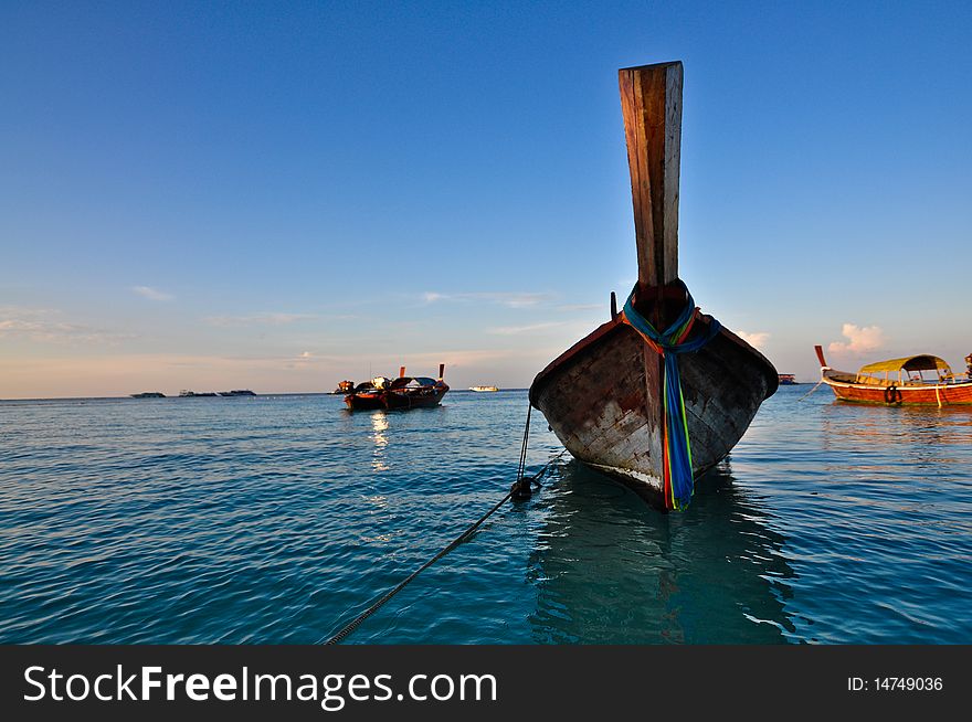 Longtail Boat, a small type of Thai tradition fishery boat use by local fisherman. Also use in travel industry transporting tourist for not long distance purpose. Longtail Boat, a small type of Thai tradition fishery boat use by local fisherman. Also use in travel industry transporting tourist for not long distance purpose.