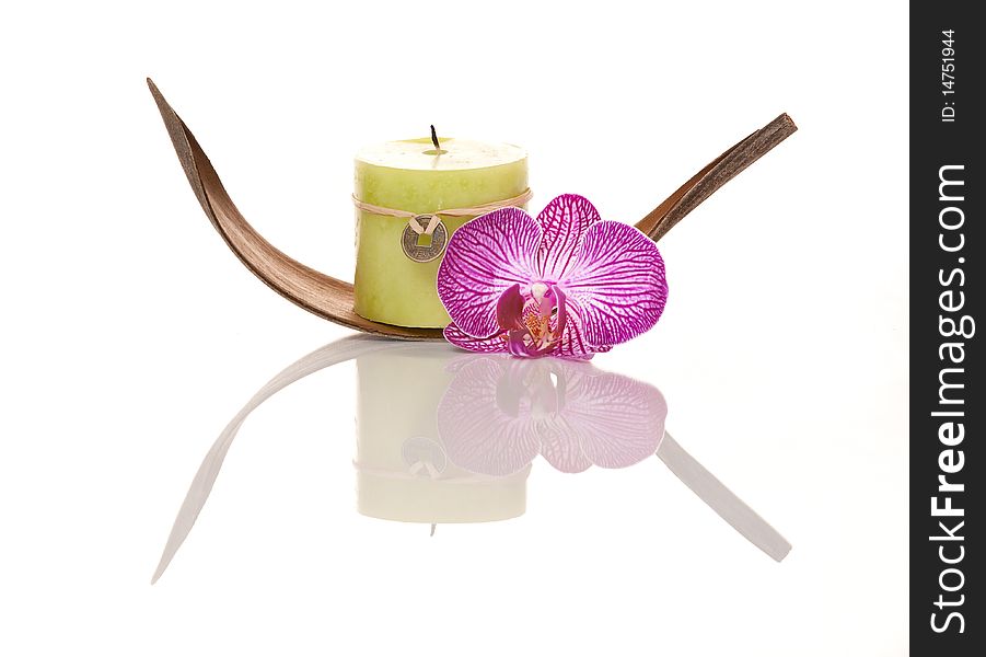 Candle Decorated With Orchid Flower