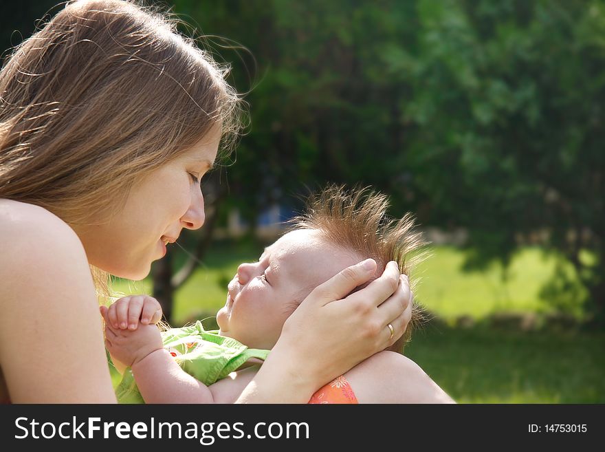 Mother And Baby Outdoors