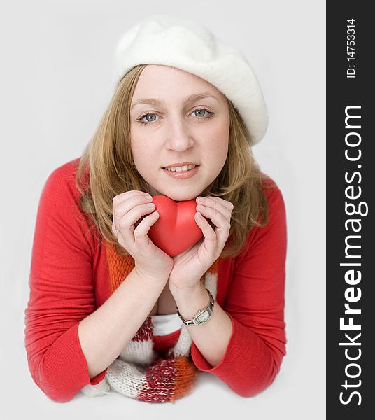 Young student in white beret with heart