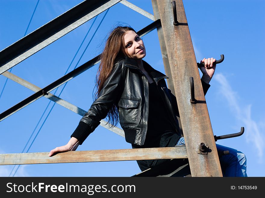 Woman On Electrical Tower