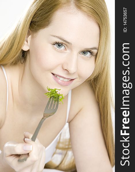 Portrait of woman eating salad. Portrait of woman eating salad