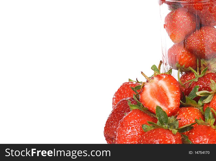 Glass with strawberry on white background