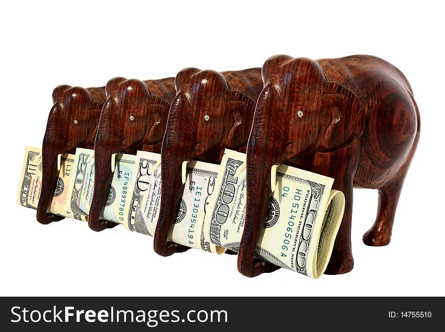 The four wooden elephant wich bears a banknote
