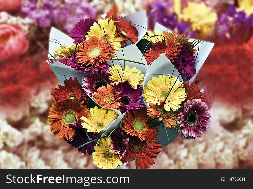 a bouquet of flowers with a blurred background