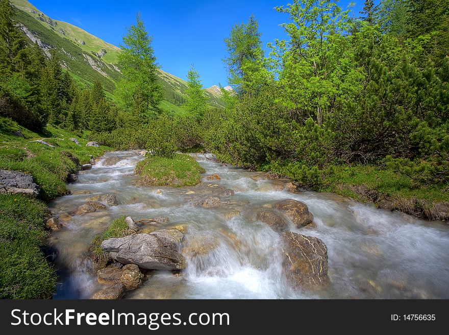 Small alpine mountain river in the heart of austria - tyrol.