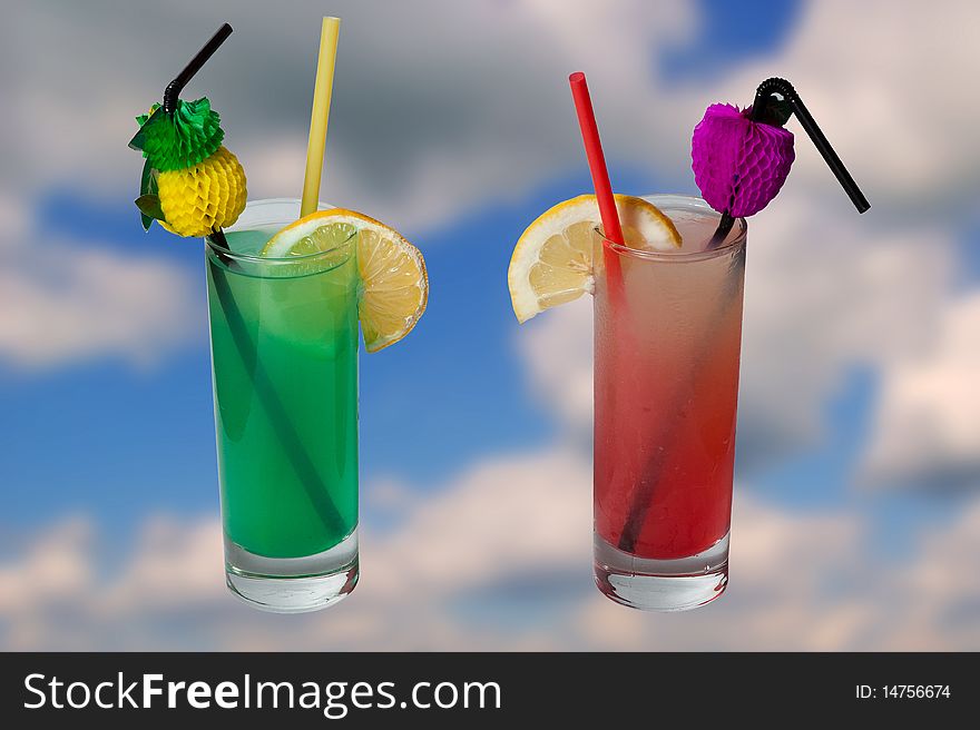 2 cocktails on sky background. 2 cocktails on sky background