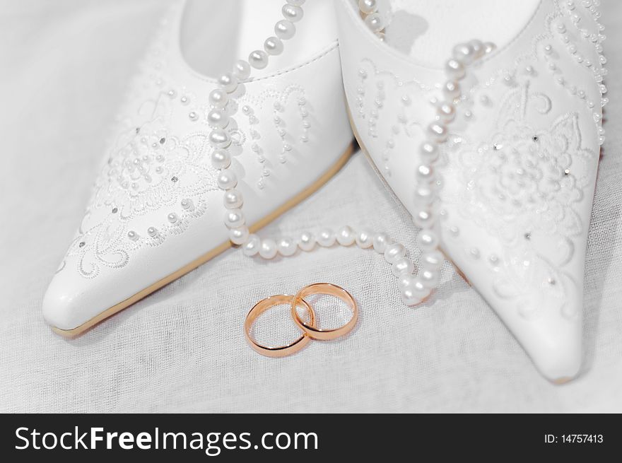 Beautiful background with two gold wedding rings