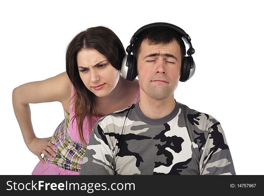 The guy one listens to music in ear-phones and does not allow to listen to the girl. The guy one listens to music in ear-phones and does not allow to listen to the girl