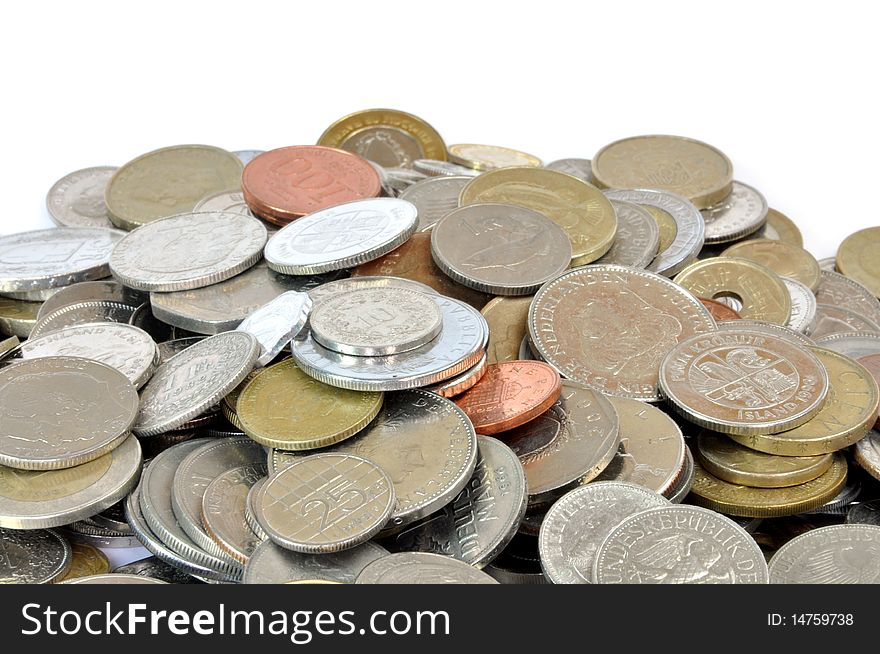 A heap of coins from different countries. A heap of coins from different countries