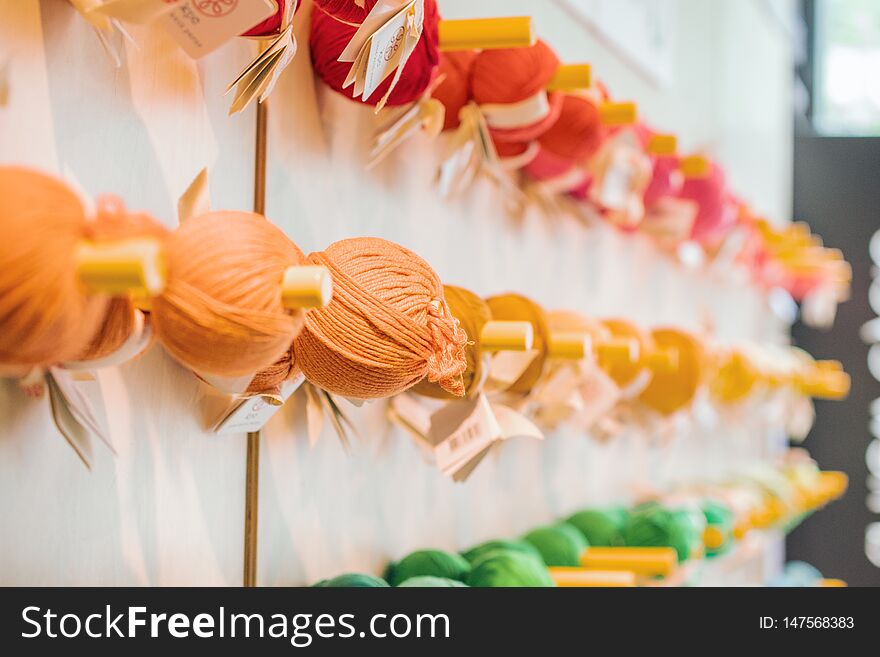 Displaying wool on a wall, in a factory