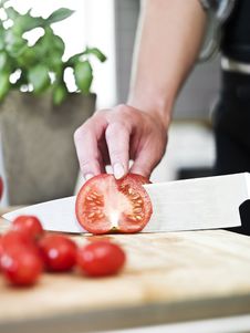 Cutting Tomatoes Royalty Free Stock Photography Cutting Tomatoes Royalty Free Stock Photography