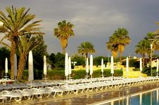 Empty Chaise Longues After The Rain Stock Image Empty Chaise Longues After The Rain Stock Image