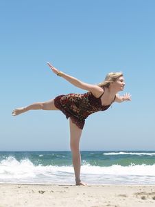 Young Blonde Woman Vacationing At The Beach Royalty Free Stock Images