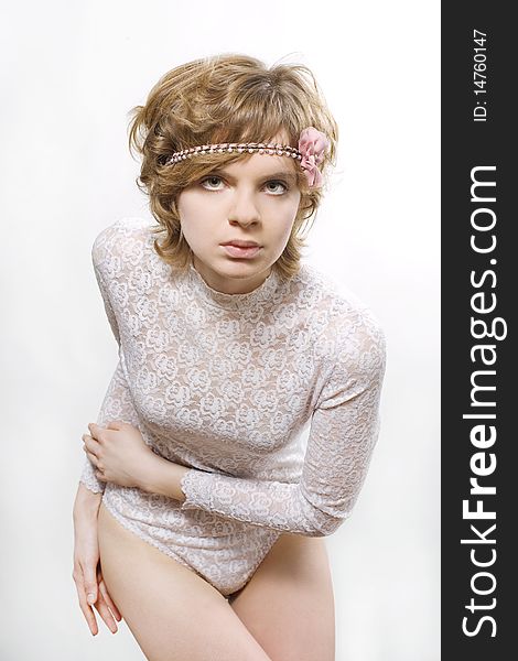 Fashion portrait of a young woman dressed in lace underwear. Fashion portrait of a young woman dressed in lace underwear.