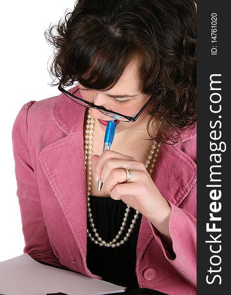 Brunette business woman concentrating on her work