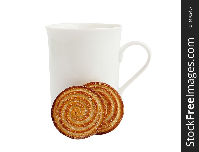 White cup with cookies on a white background