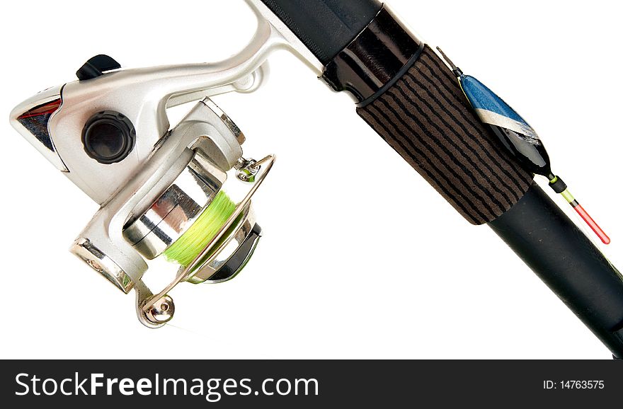 Sports fishing reel loaded with yellow braid line on white background