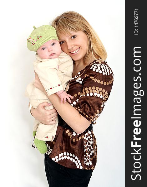 Photo of happy mother with the child on a white background. Photo of happy mother with the child on a white background