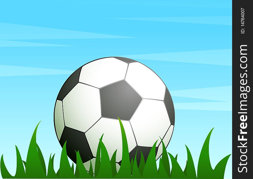 Football on a green grass for a design