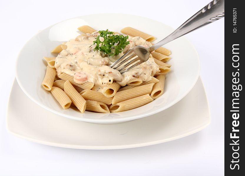 Penne With White Sauce On A Plate