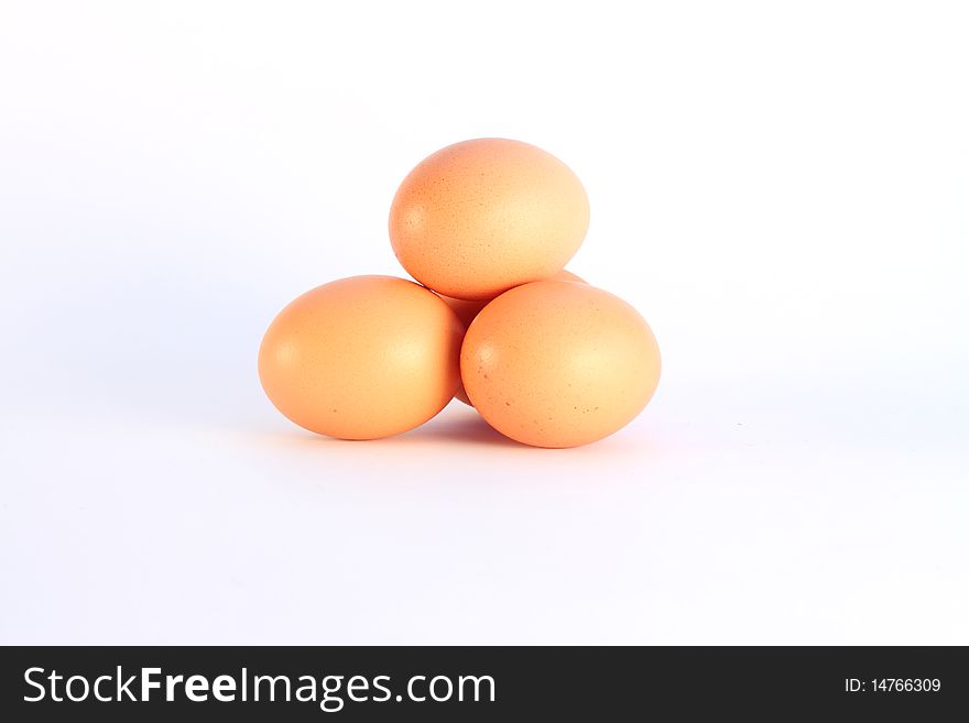 Four brown eggs isolated on a white background. Four brown eggs isolated on a white background