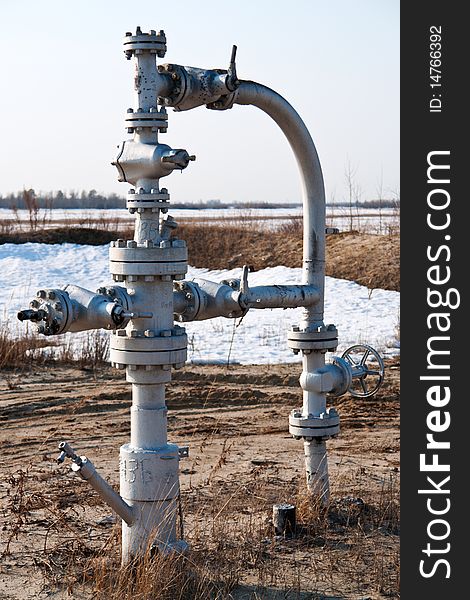 Wellhead in the oil and gas industry. spring.