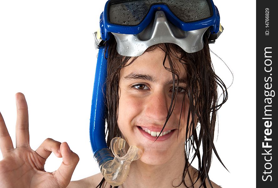 Attractive teenager with long wet hair, wearing a diving mask, showing ok, isolated on a white background. Attractive teenager with long wet hair, wearing a diving mask, showing ok, isolated on a white background