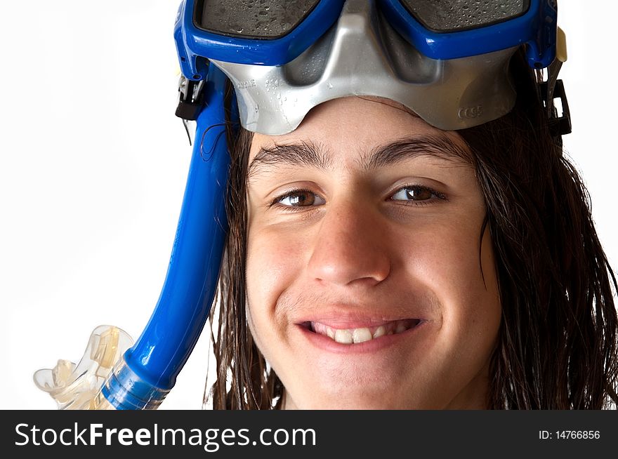 Attractive teenager with long wet hair, wearing a diving mask isoloated  on a white background. Attractive teenager with long wet hair, wearing a diving mask isoloated  on a white background